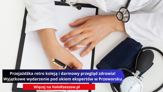 Lekarz w białym kitlu piszący długopisem na podkładce z czystą kartką papieru, obok stetoskop i ciśnieniomierz.